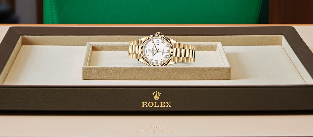 Rolex Day-Date | 128238 | Day-Date 36 | หน้าปัดสีอ่อน | ขอบหน้าปัดแบบเซาะร่อง | หน้าปัดสีขาว | ทองคำ 18 กะรัต | m128238-0076 | ชาย Watch | Rolex Official Retailer - Siam Swiss