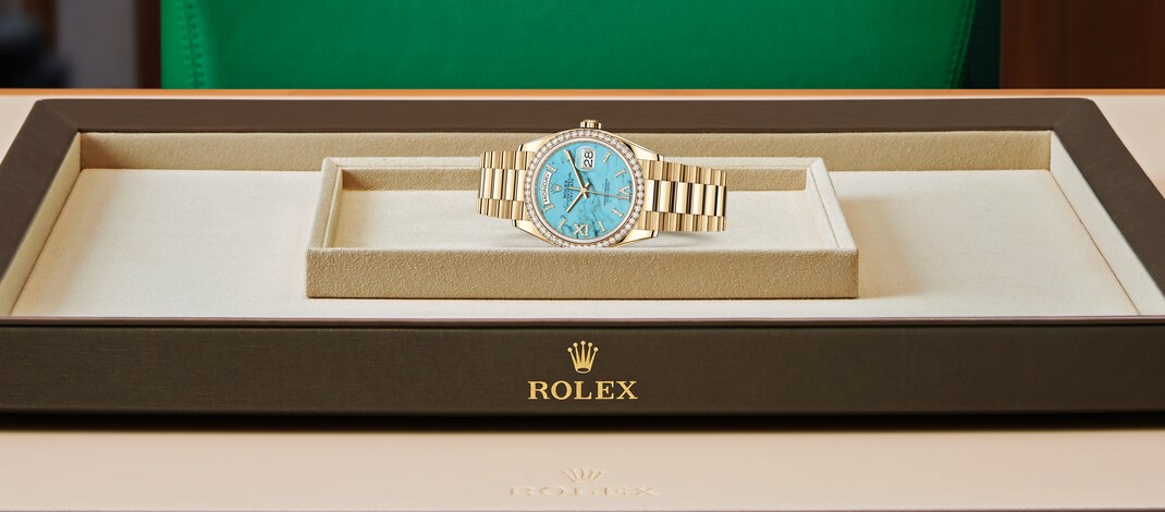 Rolex Day-Date | 128348RBR | Day-Date 36 | Coloured dial | Turquoise Dial | Diamond-Set Bezel | 18 ct yellow gold | m128348rbr-0037 | Women Watch | Rolex Official Retailer - Siam Swiss